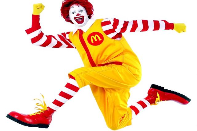 In a game of charades, Ronald illustrates how to run away with someone's money